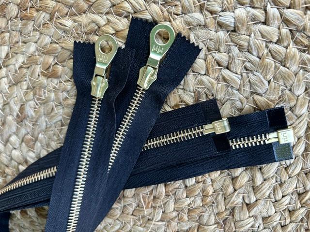 Reissverschluss riri, teilbar, Schwarz/Gold mit KTA Schieber, 50cm